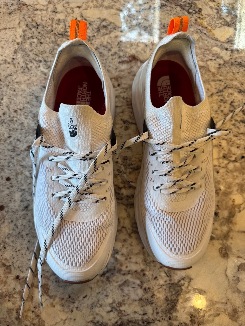 Size 9 like-new The North Face White Mesh Sneakers with Orange Heel Tabs